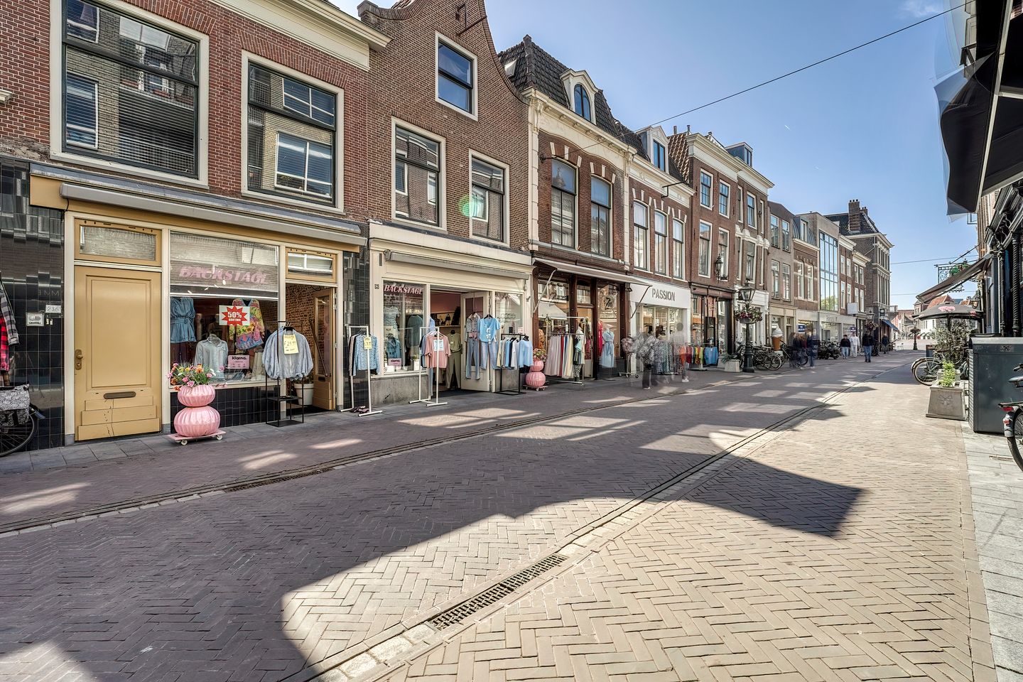 Bekijk foto 1 van Haarlemmerstraat 21-23