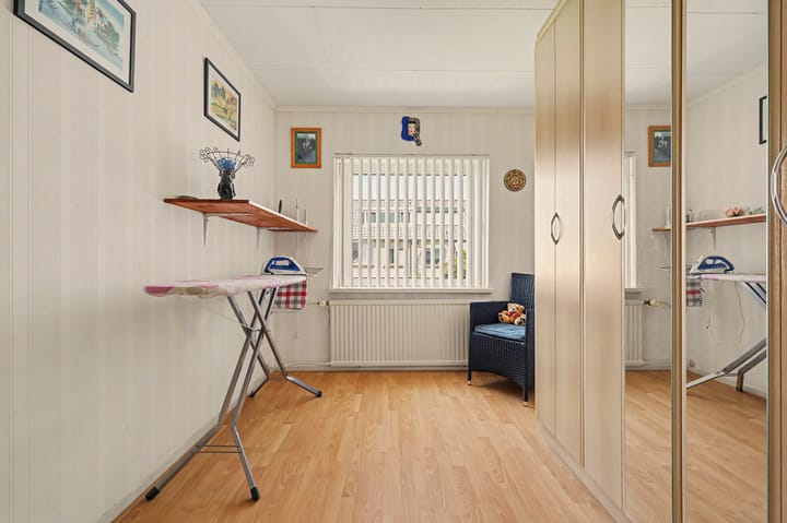 Tussenwoning te koop: J v d Woudestraat 10, Rockanje