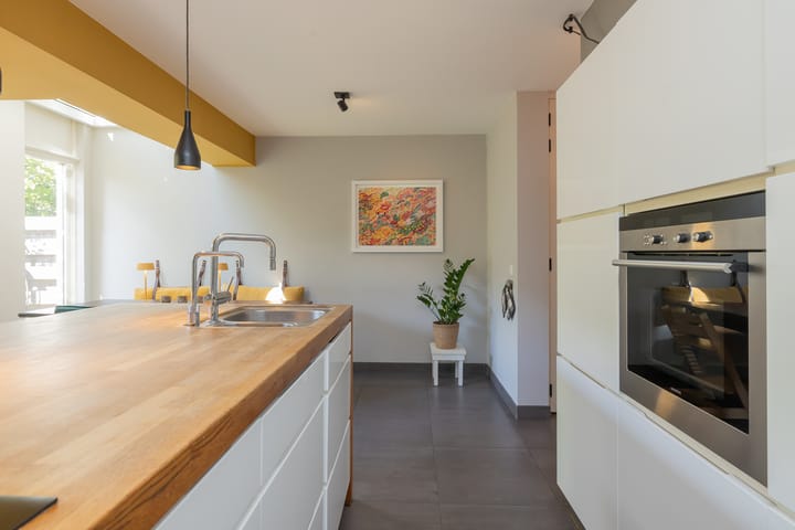 Tussenwoning te koop: Herenstraat 25, Weesp