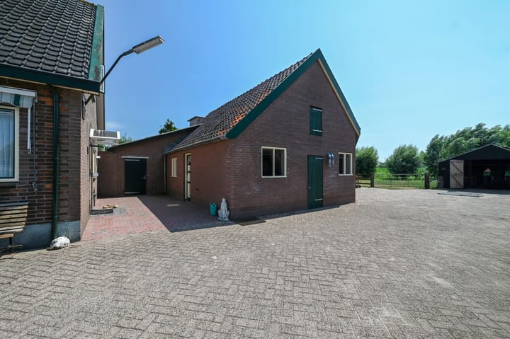 Vrijstaande woning te koop: Schras 83, Ederveen