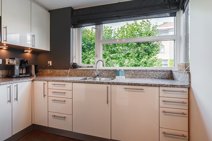 Tussenwoning te koop: W.J. van der Hooftstraat 33, Meteren
