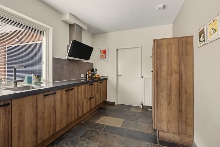 Tussenwoning te koop: De Omloop 12, Elshout