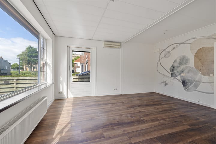 Twee-onder-één-kap te koop: K R Poststraat 3, Heerenveen