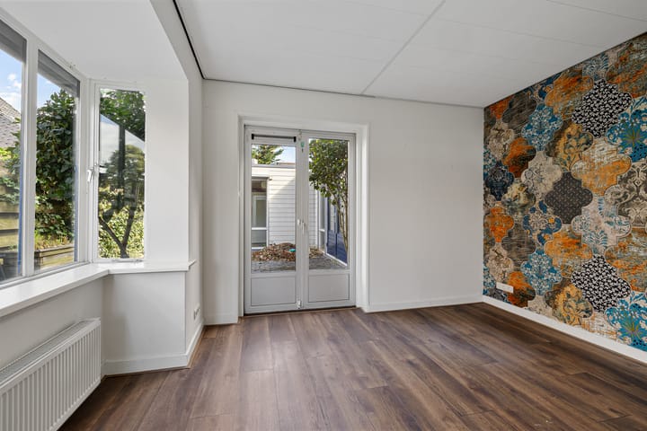 Twee-onder-één-kap te koop: K R Poststraat 3, Heerenveen