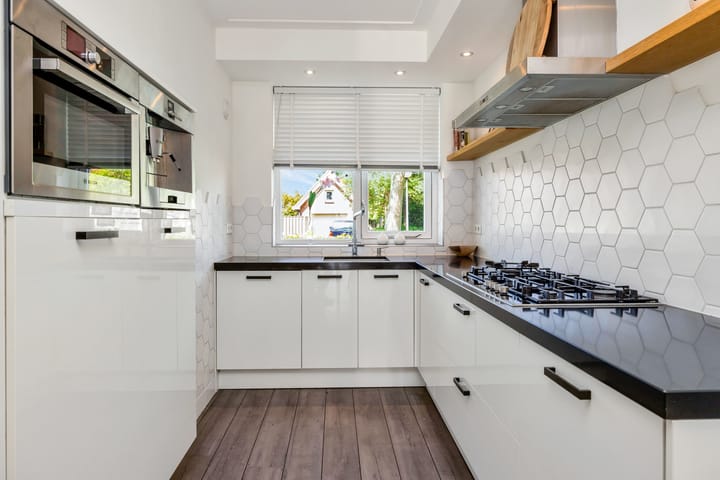 Tussenwoning te koop: Willem 't Hartstraat 21, 'T Zand