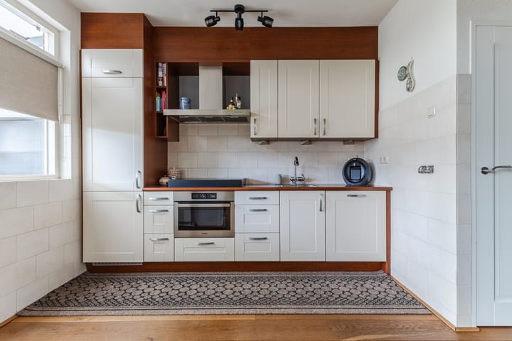 Tussenwoning te koop: Minister van Houtenstraat 10, Veghel