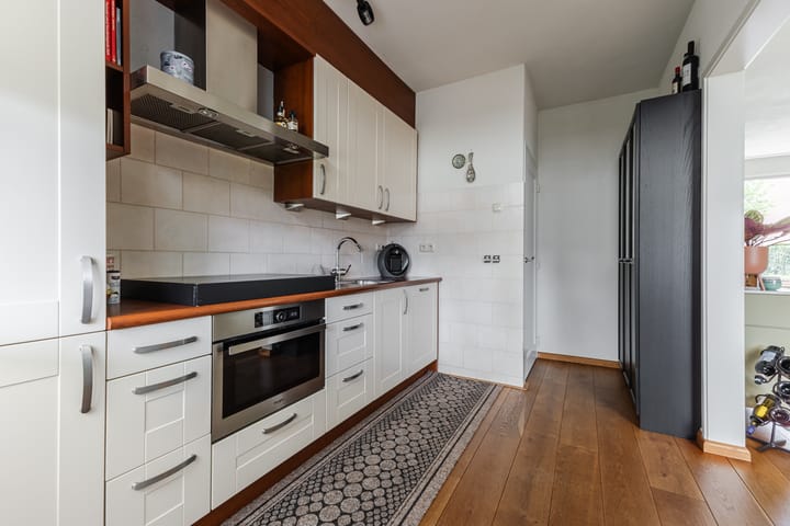 Tussenwoning te koop: Minister van Houtenstraat 10, Veghel