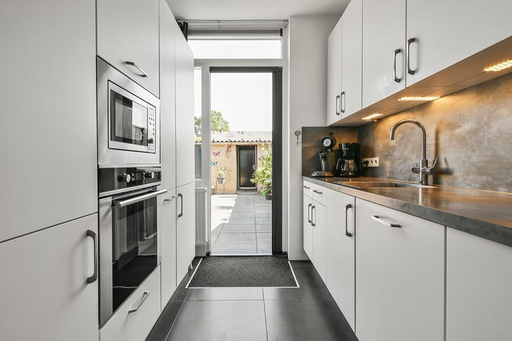 Tussenwoning te koop: Weegbreestraat 33, Nieuw-Vennep