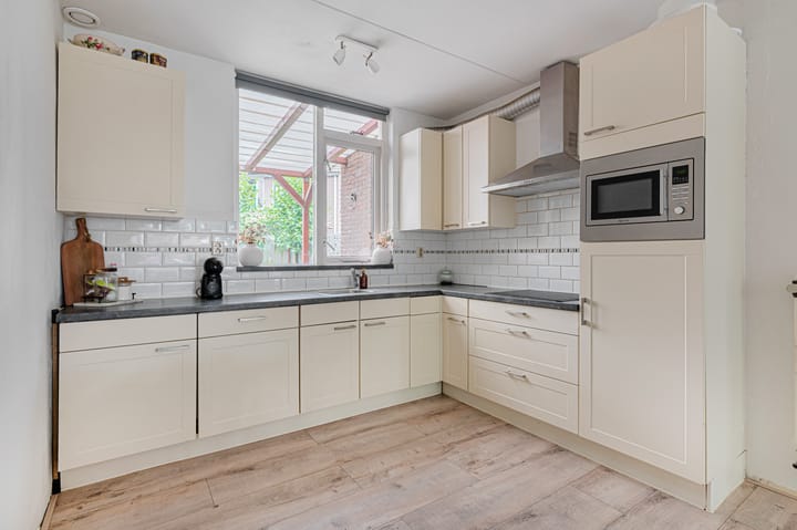 Tussenwoning te koop: Dennenweg 32, Winschoten