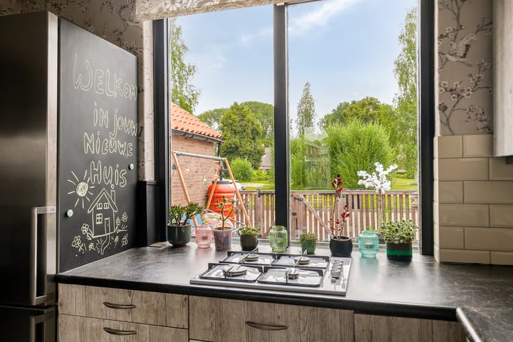 Tussenwoning te koop: Kolk 21, Scheerwolde