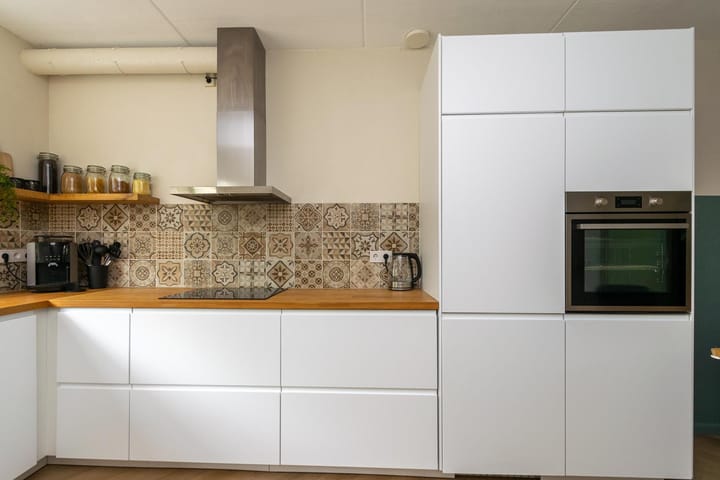 Tussenwoning te koop: Schweitzerstraat 50, Hoogeveen