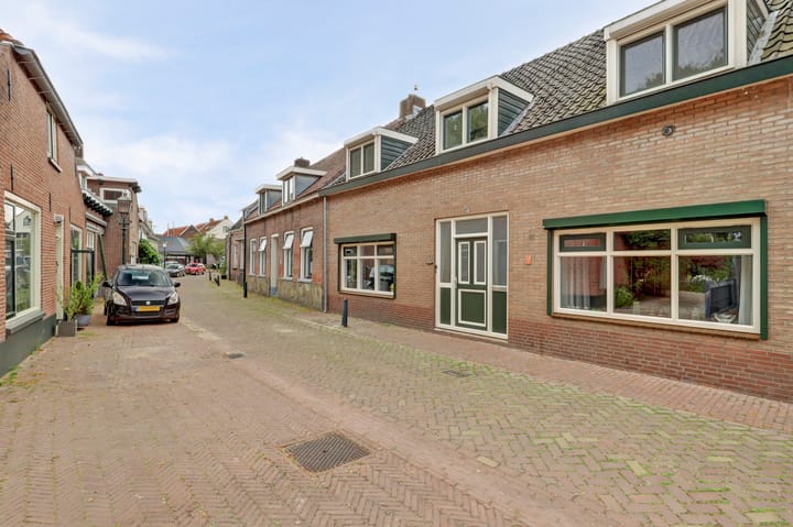 Tussenwoning te koop: Gasthuisstraat 17, Heukelum