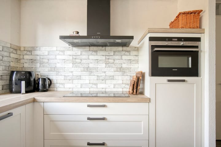 Tussenwoning te koop: Brahmalaan 12, Barneveld
