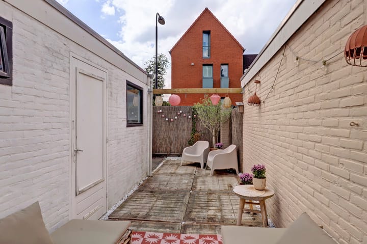Tussenwoning te koop: Julianastraat 23, Leerdam