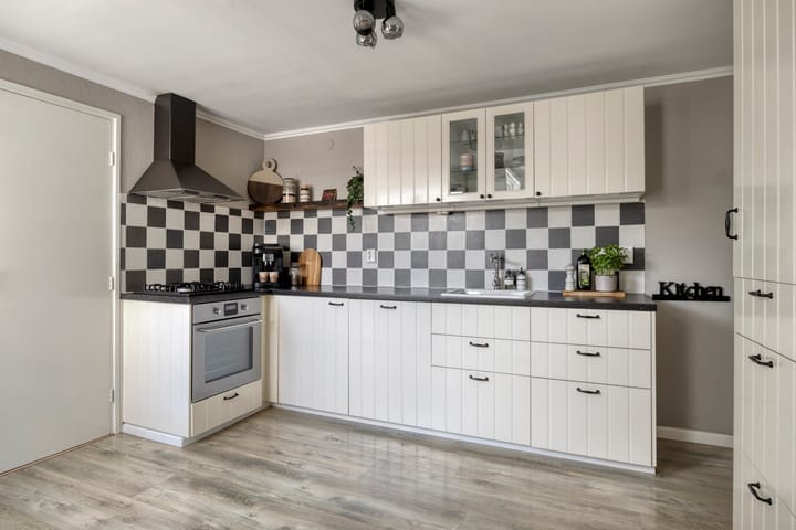 Tussenwoning te koop: Molenkampsweg 52, Borne
