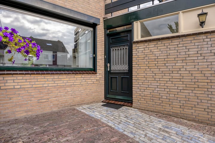 Twee-onder-één-kap te koop: de Blauwe Wereld 55, Muiden
