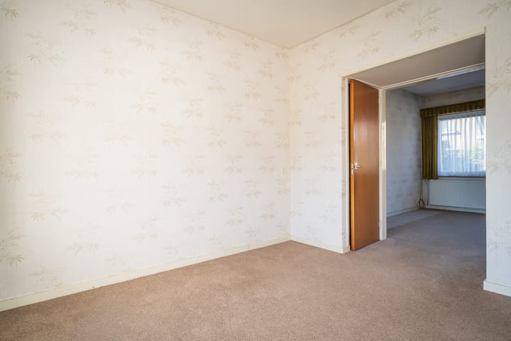 Tussenwoning te koop: Wilhelminalaan 84, Den Burg
