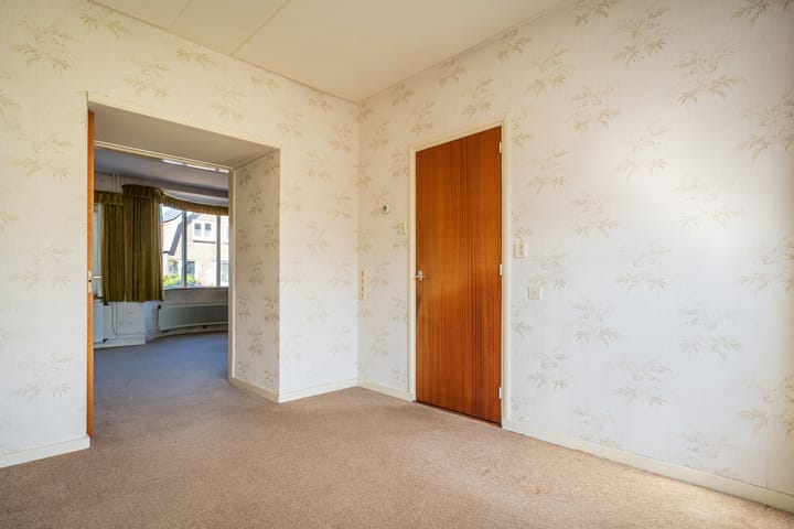 Tussenwoning te koop: Wilhelminalaan 84, Den Burg