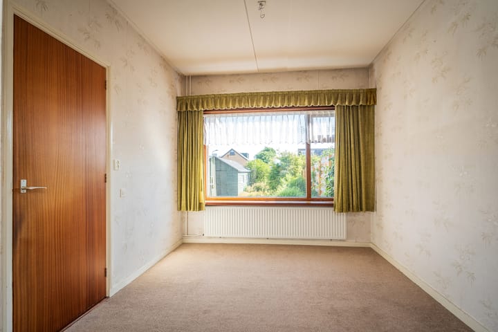 Tussenwoning te koop: Wilhelminalaan 84, Den Burg