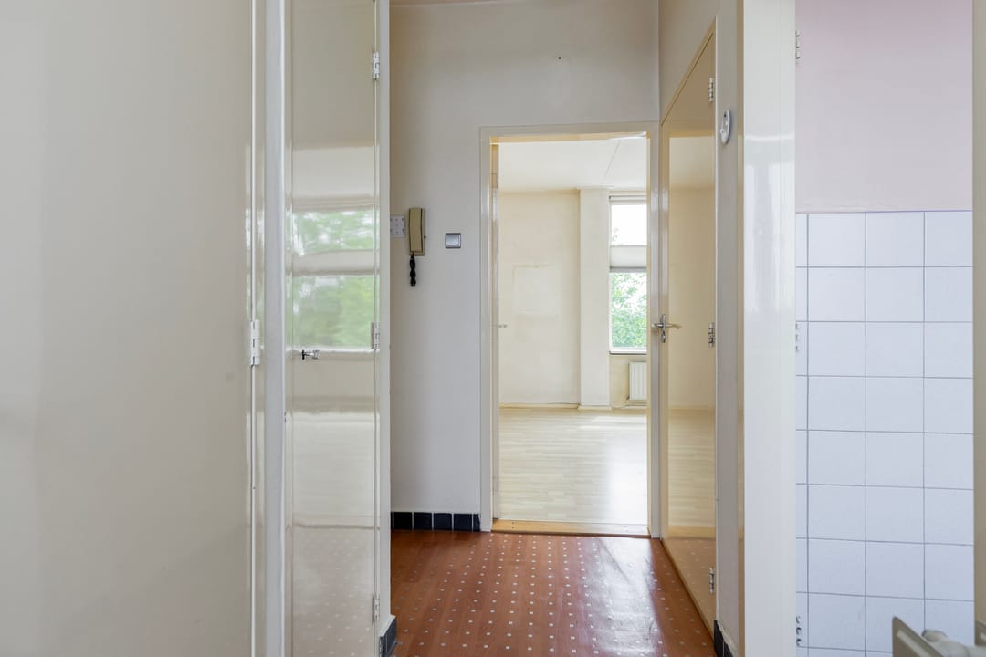 Photo 11 of Tolberterstraat 1-IV
