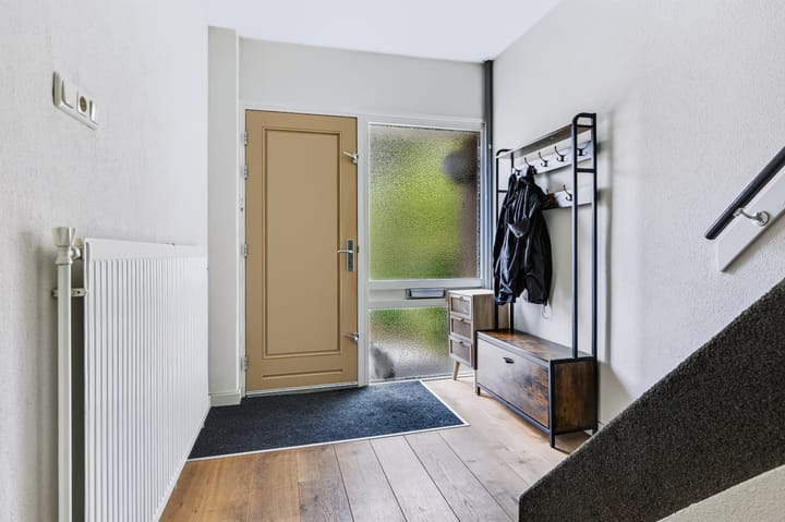 Tussenwoning te koop: Serenadestraat 10, Apeldoorn