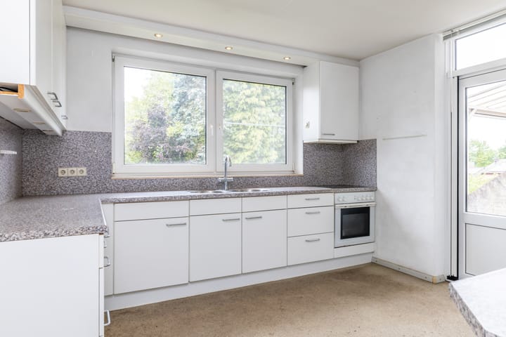 Tussenwoning te koop: Tienbundersweg 28, Wijlre
