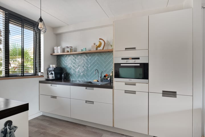 Tussenwoning te koop: Biezenbloker 16, Puttershoek
