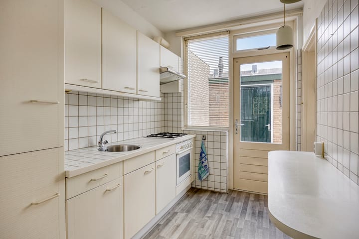 Tussenwoning te koop: Ds. van Couwenhovelaan 63, Bergschenhoek