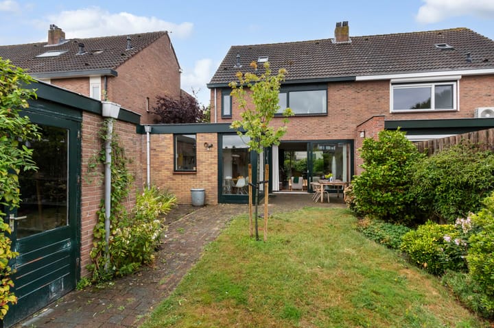 Tussenwoning te koop: Zuidsingel 57, Kortenhoef