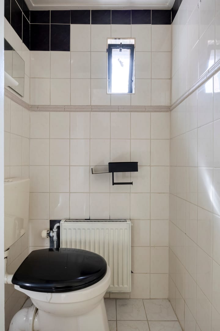Tussenwoning te koop: Jacob van Ruysdaelstraat 9, Hoogezand