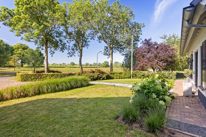 Vrijstaande woning te koop: Molenweg 8, Lithoijen