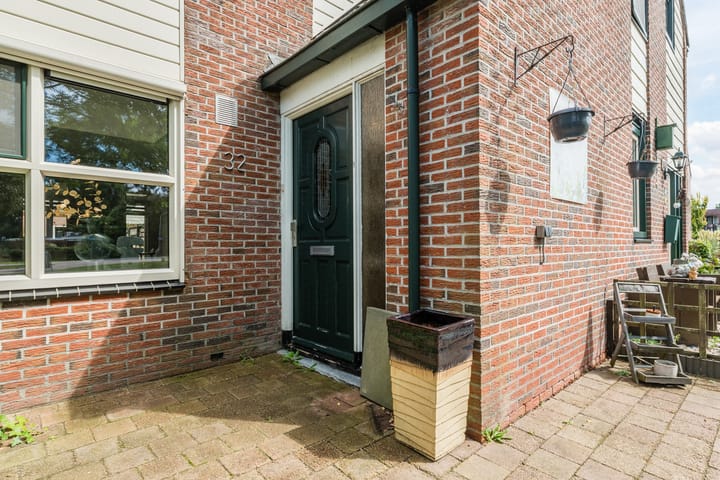 Tussenwoning te koop: Domela Nieuwenhuisweg 32, Muntendam