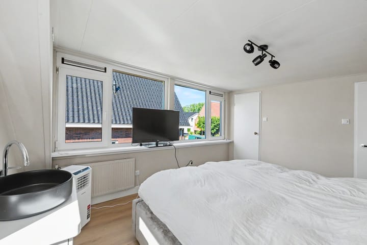 Twee-onder-één-kap te koop: Tielsestraat 21, Opheusden