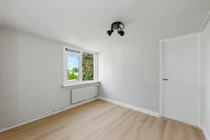 Twee-onder-één-kap te koop: Tielsestraat 21, Opheusden