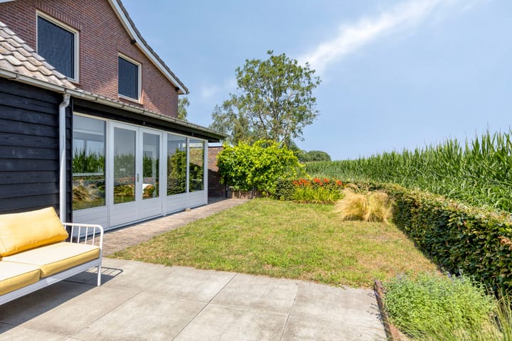 Tussenwoning te koop: Heusdenseweg 20, Elshout