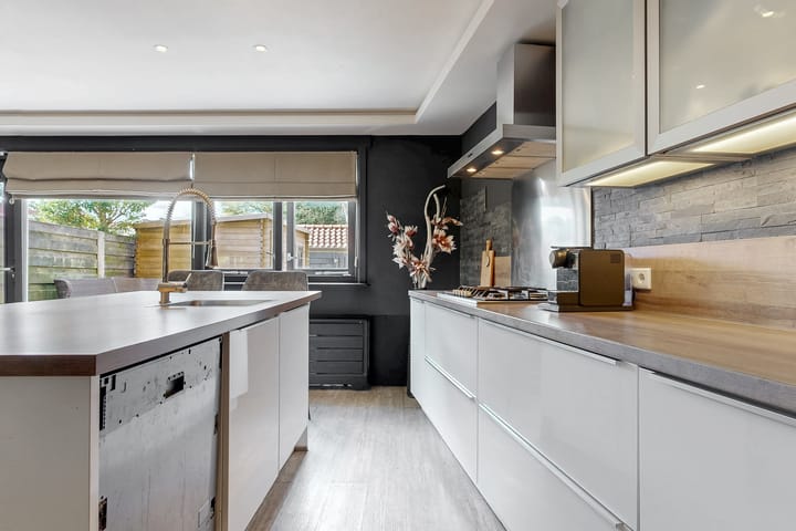 Tussenwoning te koop: T.B. Huurmanlaan 6, Bussum