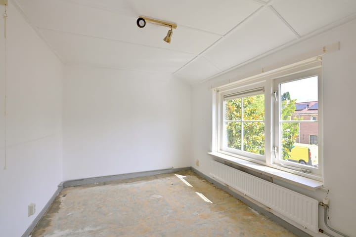 Tussenwoning te koop: Merelstraat 10, Brummen