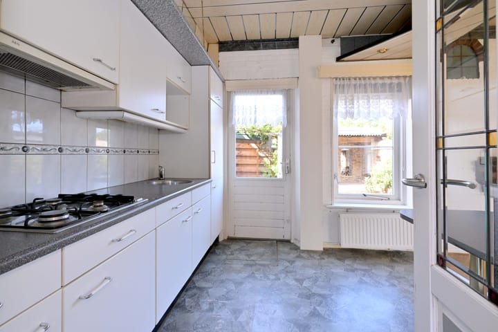 Tussenwoning te koop: Merelstraat 10, Brummen