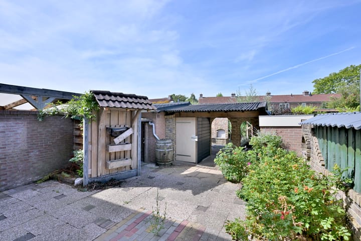 Tussenwoning te koop: Merelstraat 10, Brummen