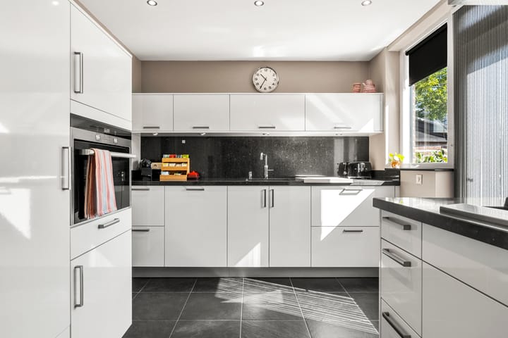 Tussenwoning te koop: Halderweg 13, Bennekom