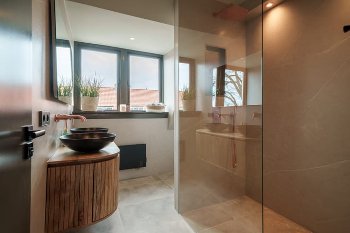 Tussenwoning te koop: K.P.C. de Bazelstraat 23, Bussum