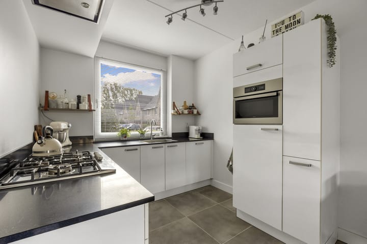 Tussenwoning te koop: Rijnlanderlaan 22, Barneveld