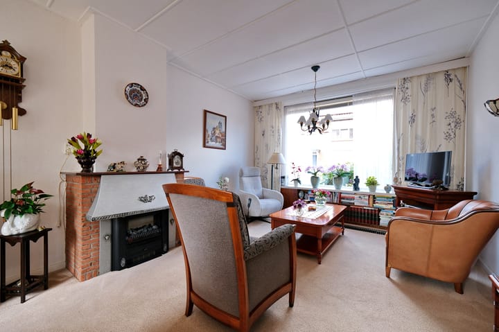 Tussenwoning te koop: Bremlaan 37, Ede