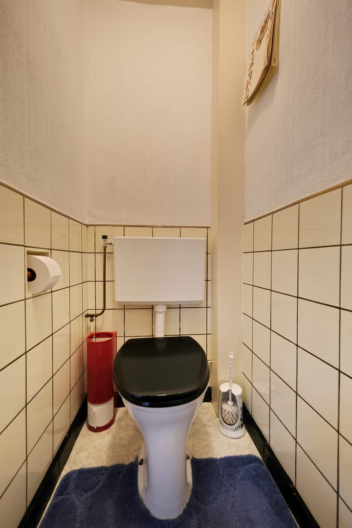 Tussenwoning te koop: Bremlaan 37, Ede