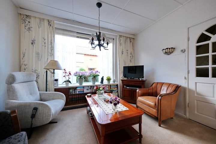 Tussenwoning te koop: Bremlaan 37, Ede