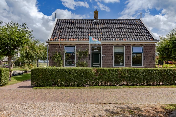 Vrijstaande woning te koop: Dorpsstraat 15, Watergang