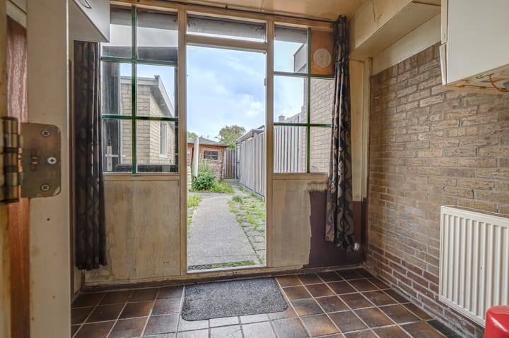 Tussenwoning te koop: Veilingweg 39, Warmenhuizen