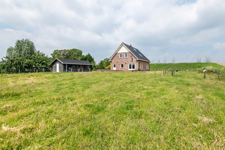 Vrijstaande woning te koop: Rijnbandijk 17, Ingen