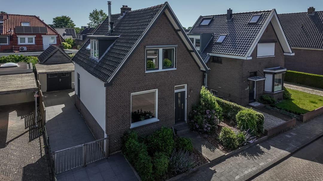 Foto 43 van Tienwoningenweg 13