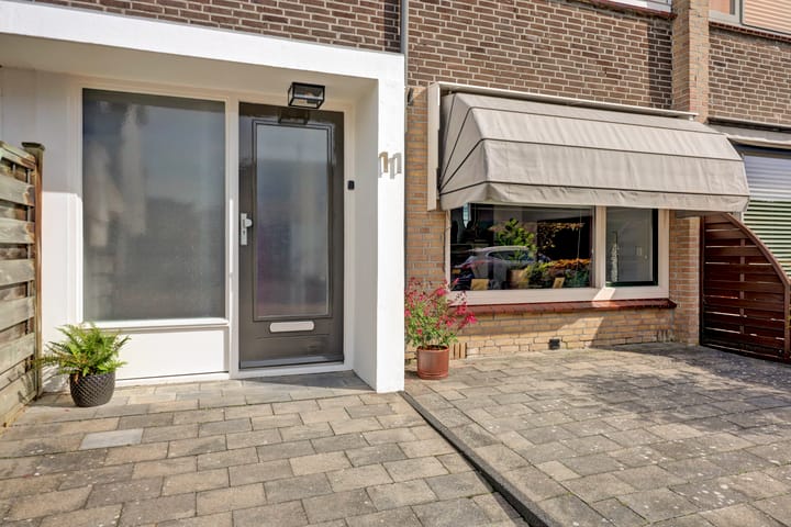 Tussenwoning te koop: Collegiantenstraat 11, Rijnsburg